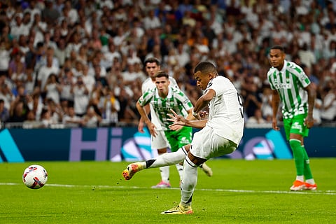 La Liga 2024-25 Real Madrid vs Real Betis: Real Madrid's Kylian Mbappe shoots a penalty kick to score his sides second goal